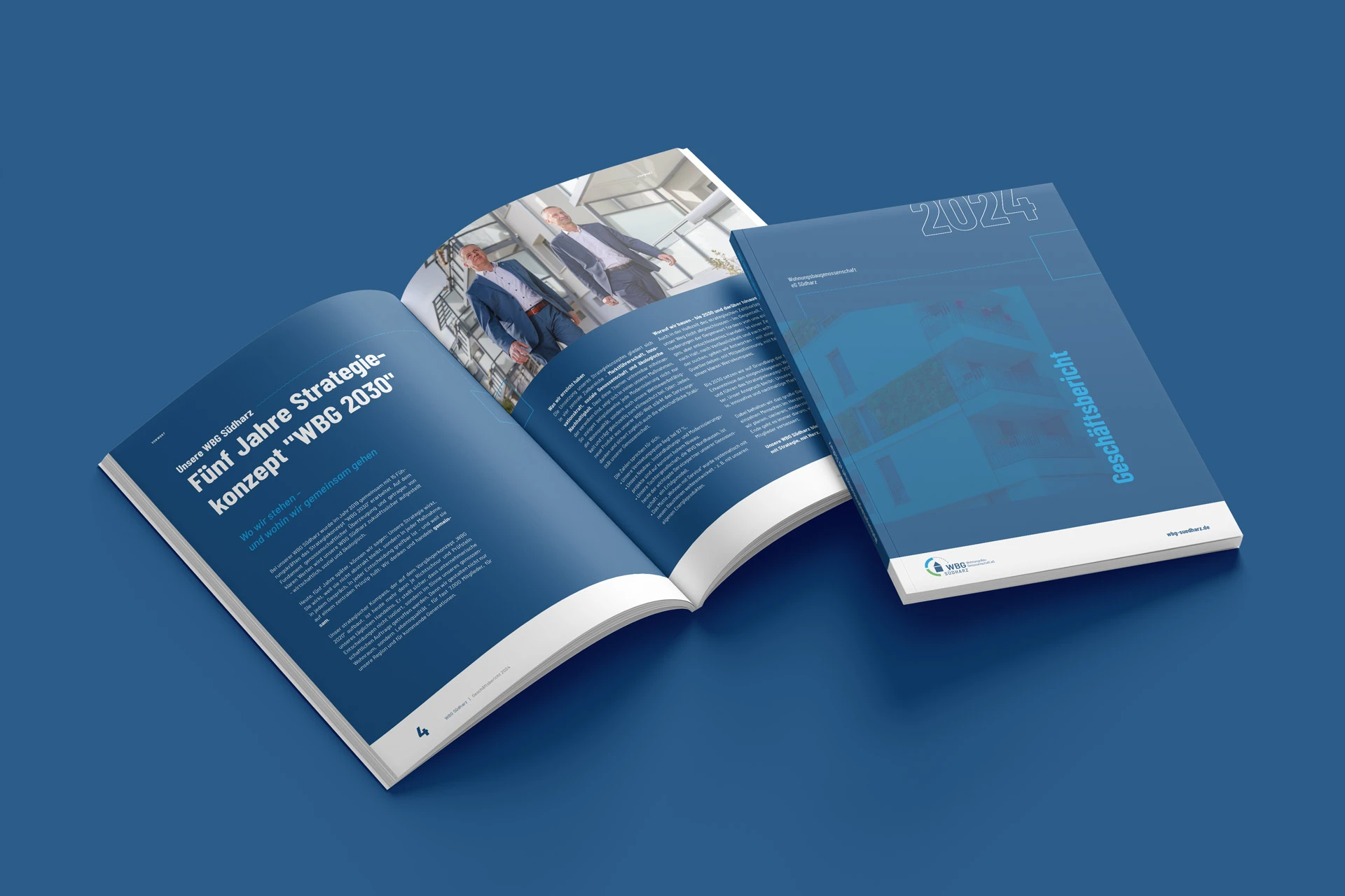 Aufgeschlagener Geschäftsbericht der WBG Südharz mit blauem Titel „Fünf Jahre Strategiekonzept WBG 2030“.